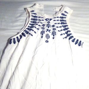 White dress with blue flowers